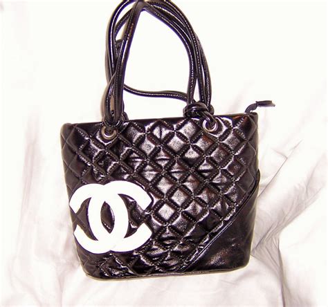 black chanel purse with white logo|authentic chanel black purse.